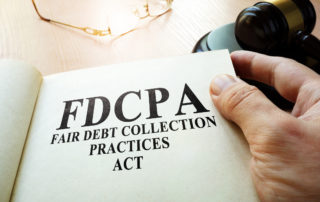 Fair Debt Collection Practices Act FDCPA On a Table